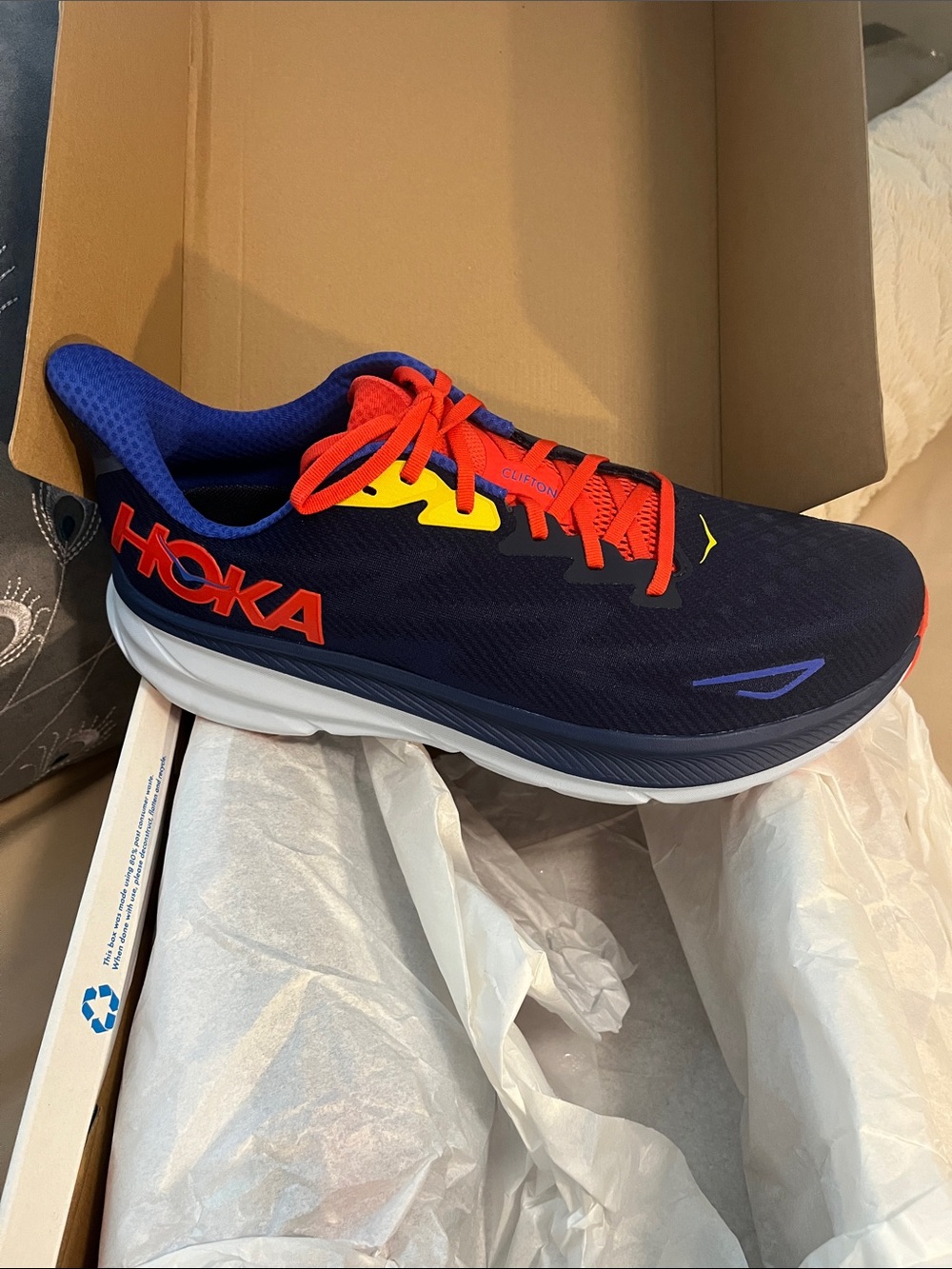 Hoka Men's Running Shoe - Navy with Red & Yellow Accents